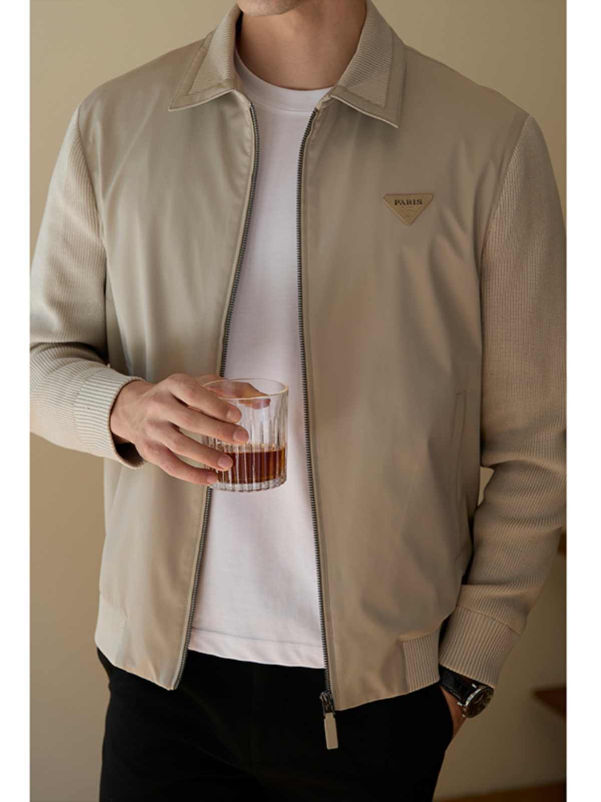 Side profile of a men's black splicing jacket, perfect for casual or semi-formal wear.