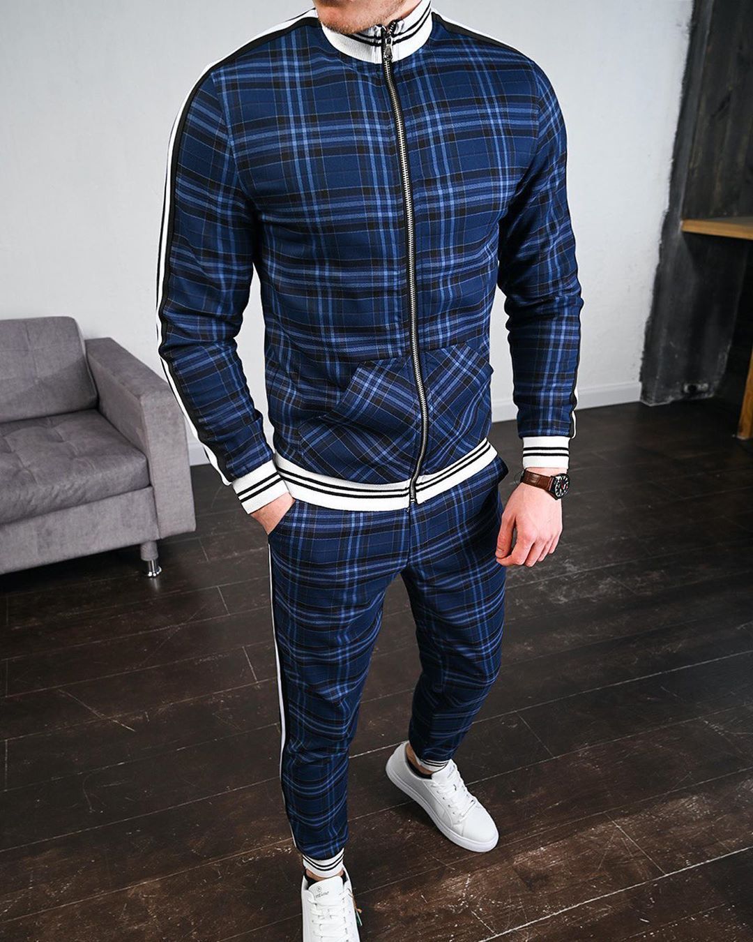 Back view of blue-green striped suit set for men