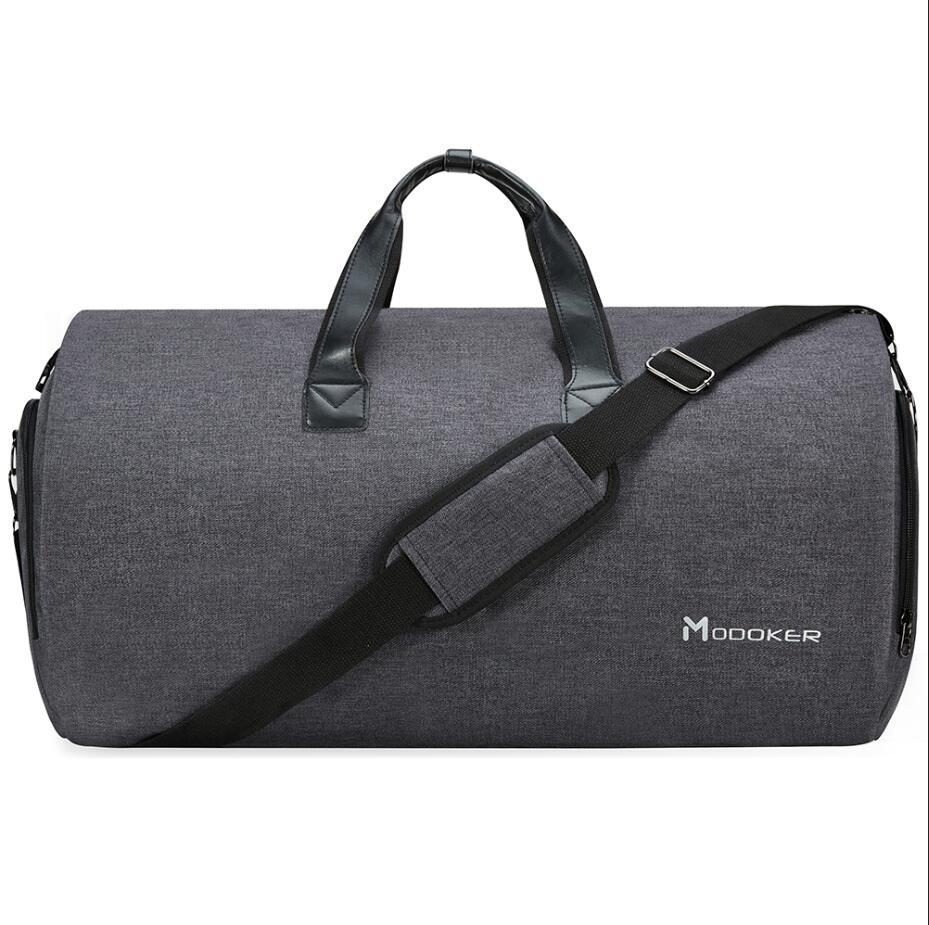 Garment bag holding business attire in wrinkle-free position