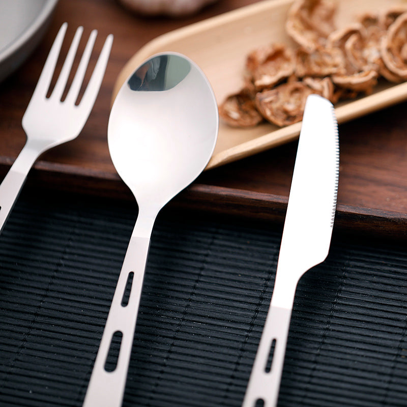Compact travel-friendly knife crafted from polished titanium