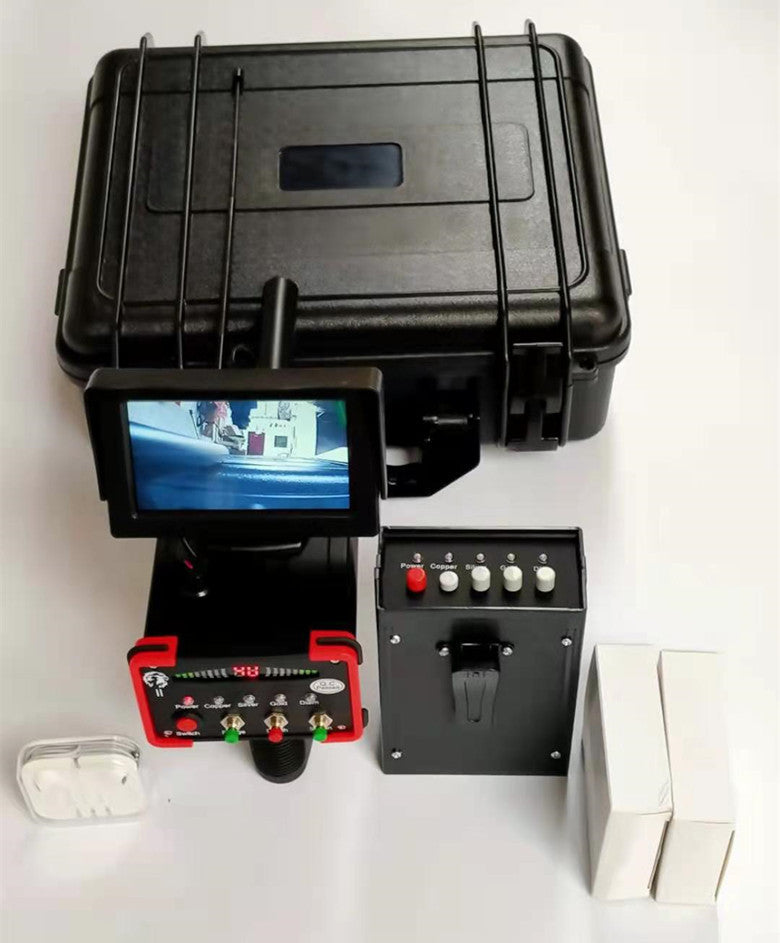 Metal detector kit including transmitter, receiver, earphones, charger, and carrying case.