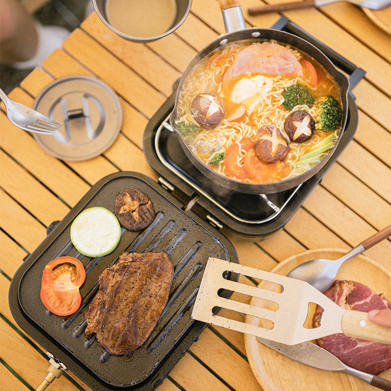Efficient and portable double burner gas stove with a built-in ignition system.