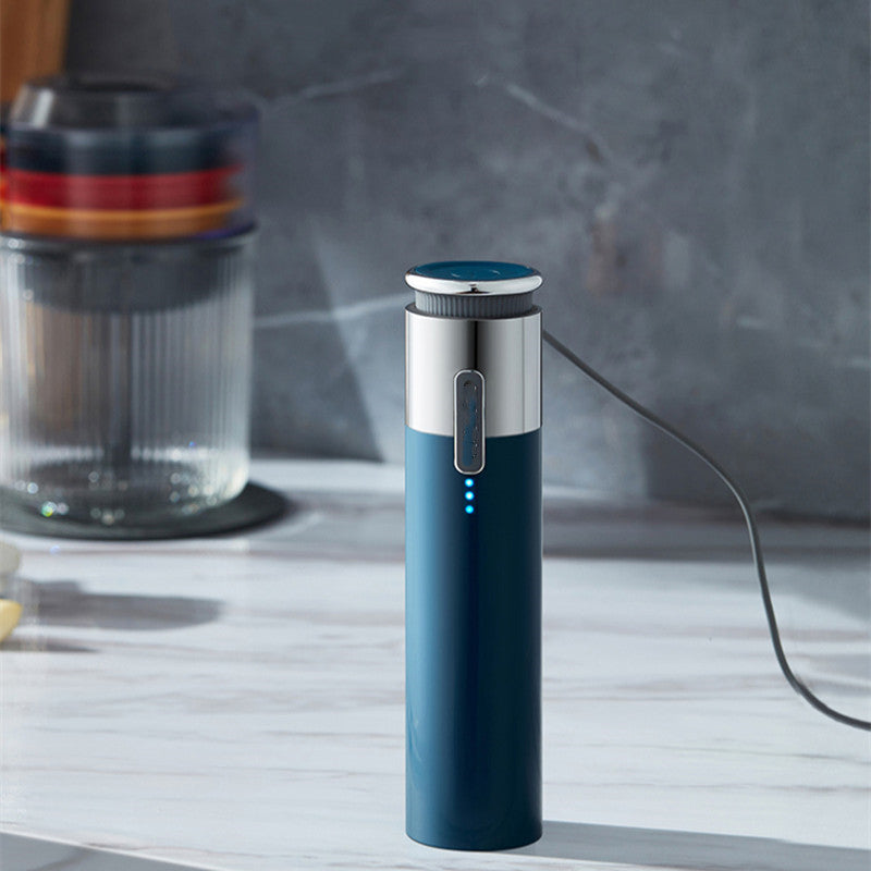 Compact electric grinder designed for vegetables, spices, and sauces, ideal for home kitchens.