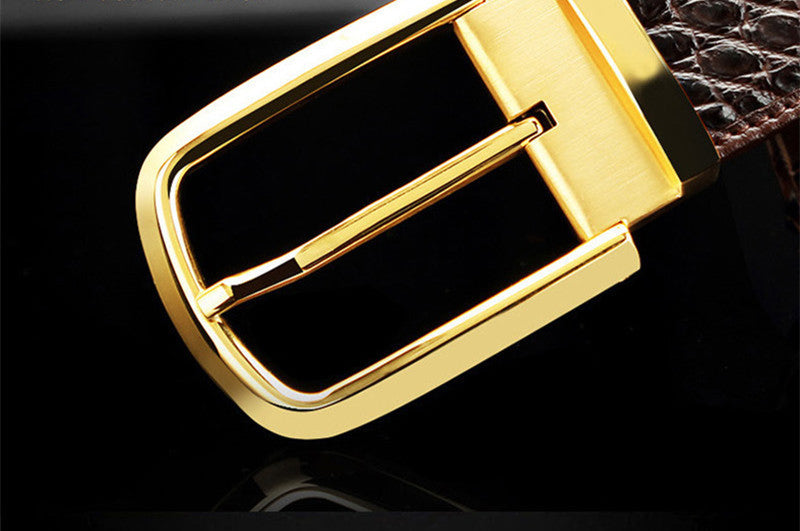 Detailed view of the crocodile texture on a men's business casual leather belt.