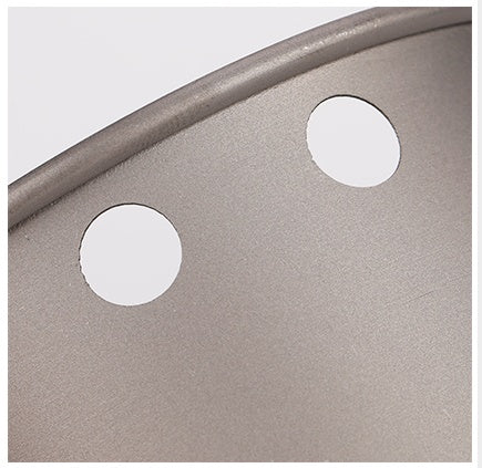 Compact titanium stove stored inside small travel pouch