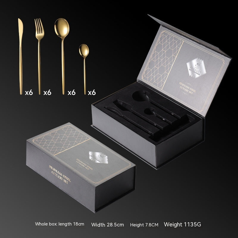 Elegant gold titanium-plated 24-piece tableware set displayed in a premium wooden case.