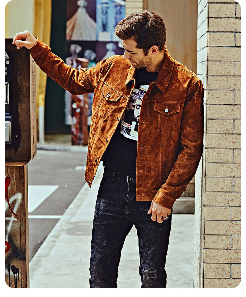 Close-up of pigskin leather texture in men’s brown biker jacket