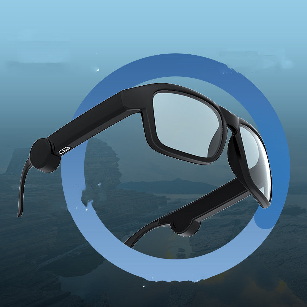 Stylish man using black audio sunglasses for music and calls