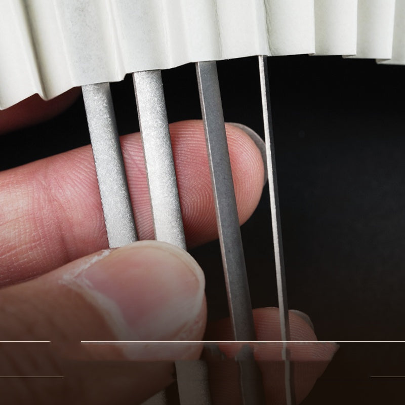 Person Using the Outdoor Mini Folding Fan for Cooling and Style