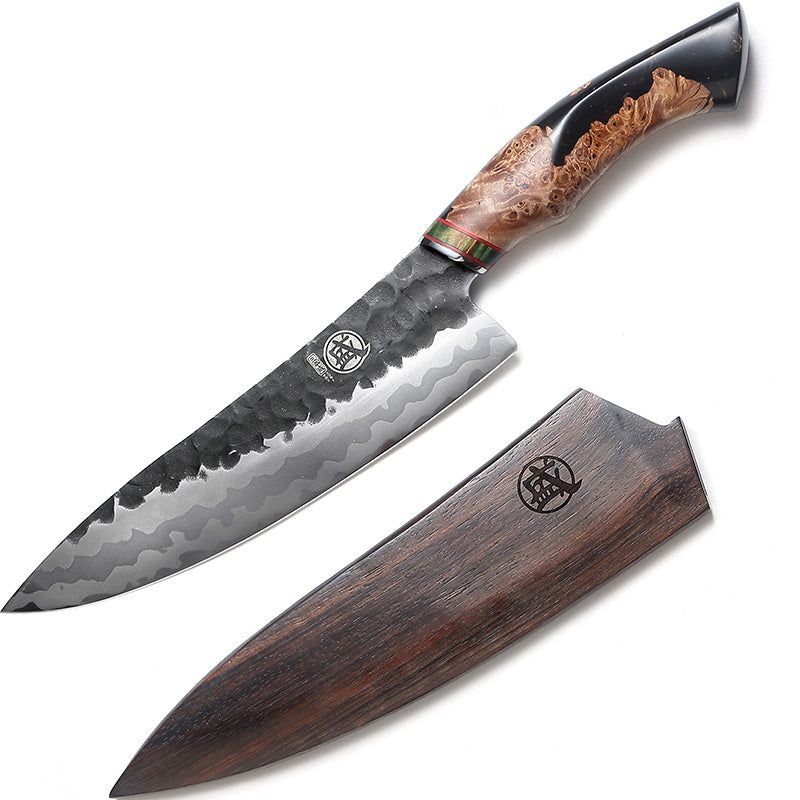 Damascus steel knife placed beside its elegant wooden sheath on a white background.