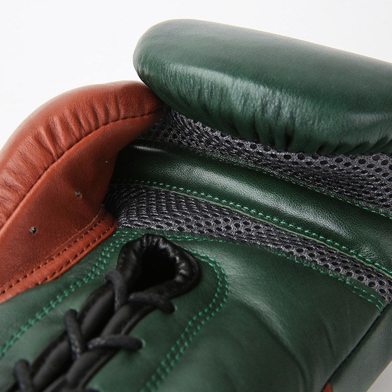 Close-up of the hand-dyed leather texture and stitching