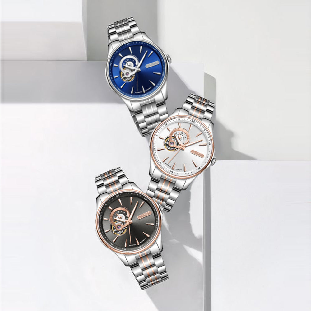 Three color variants of the luxury watch: blue, black, and rose gold, displayed together.