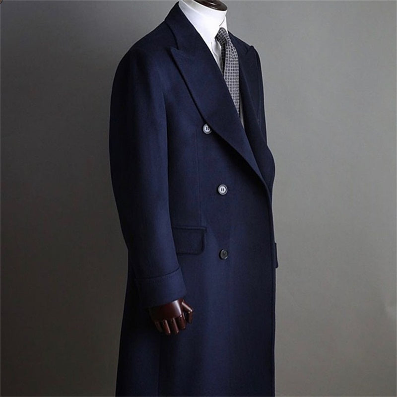 Rear view of medium-length black cashmere coat with tailored cut