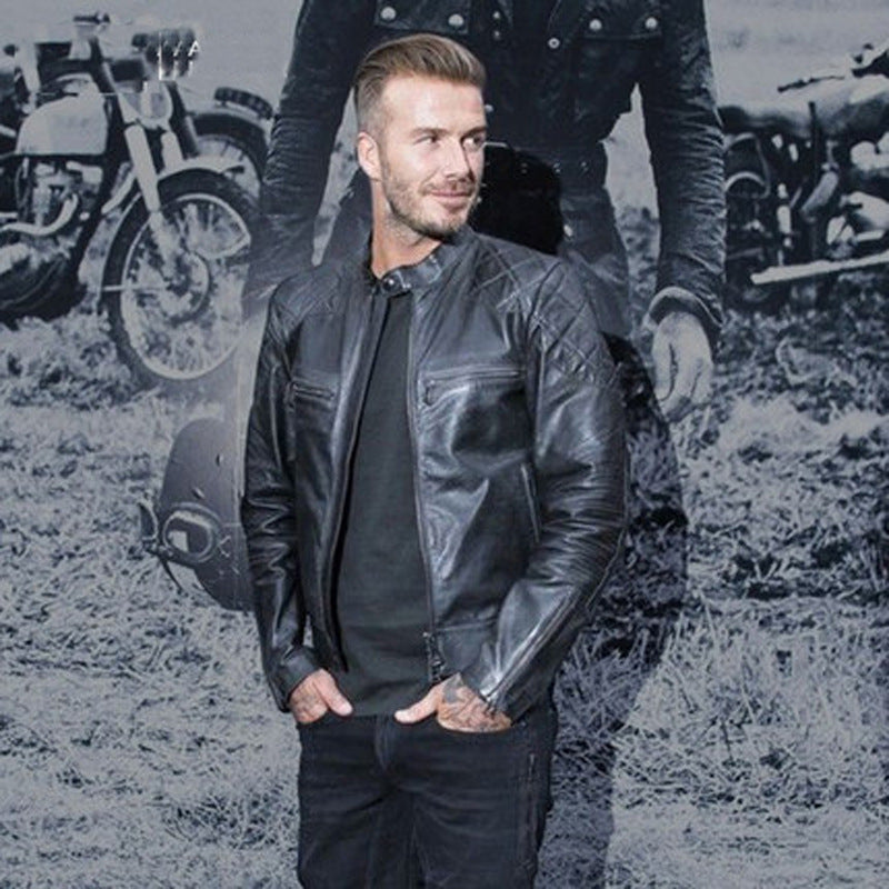Back view highlighting the distressed leather texture and tailored fit of the jacket.