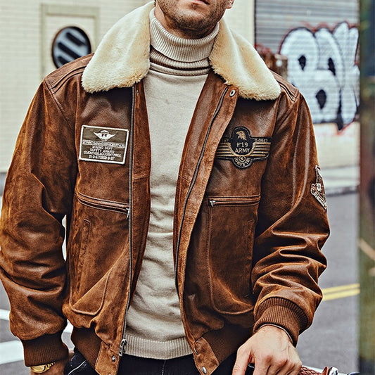 Man wearing a brown leather jacket with shearling collar, styled with a beige turtleneck for a timeless and rugged look.