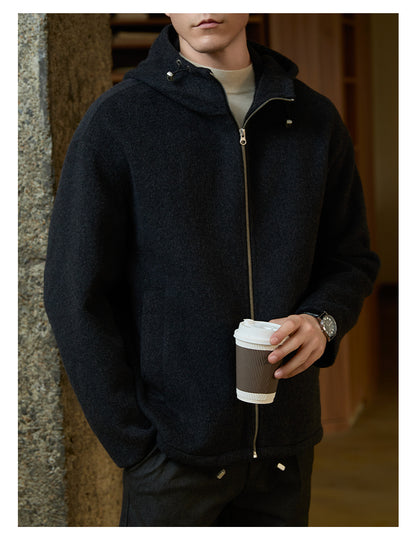 Detailed close-up of the hood design on the men’s woolen coat showing its warm and stylish structure.