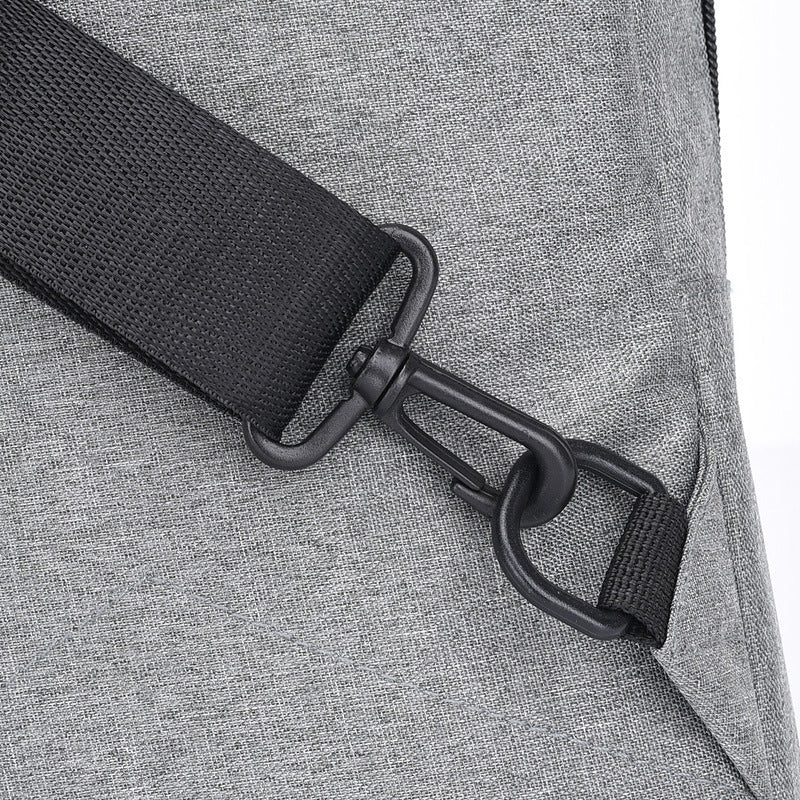 Man wearing crossbody anti-theft bag while walking outside