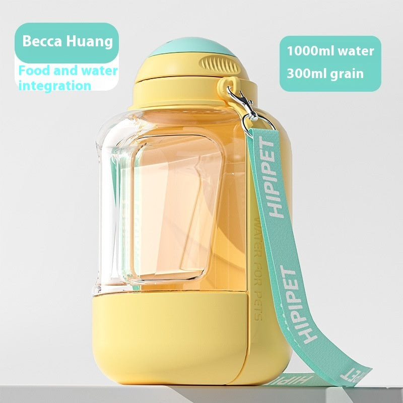Yellow pet water and food dispenser with ergonomic handle and leak-proof seal.