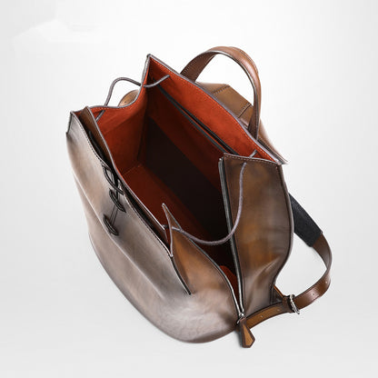 Professional man wearing a stylish leather backpack during a business meeting.