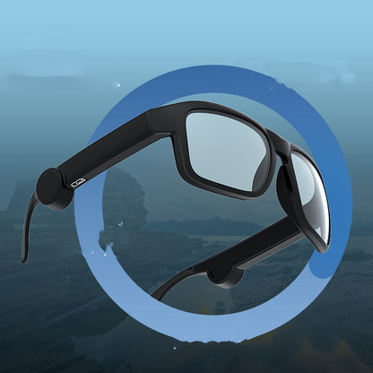 Stylish man using black audio sunglasses for music and calls