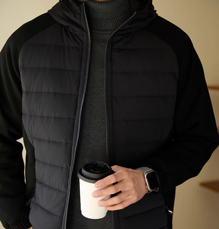 Back view of the men’s duck down jacket with sleek paneling and ergonomic cut