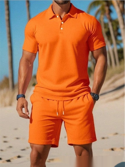 Casual seated pose showing premium RX polo shirt and shorts set