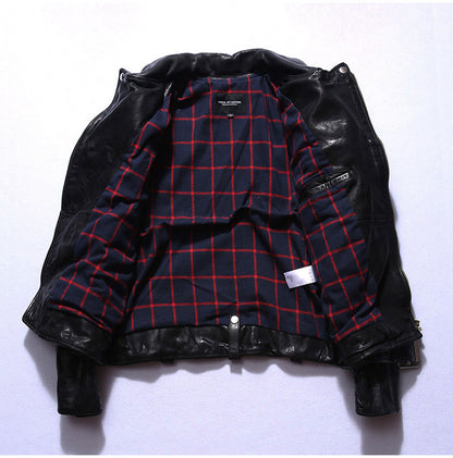 Man wearing black horse leather biker jacket in city environment
