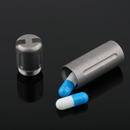 Titanium pill box with attached stainless steel keyring for EDC