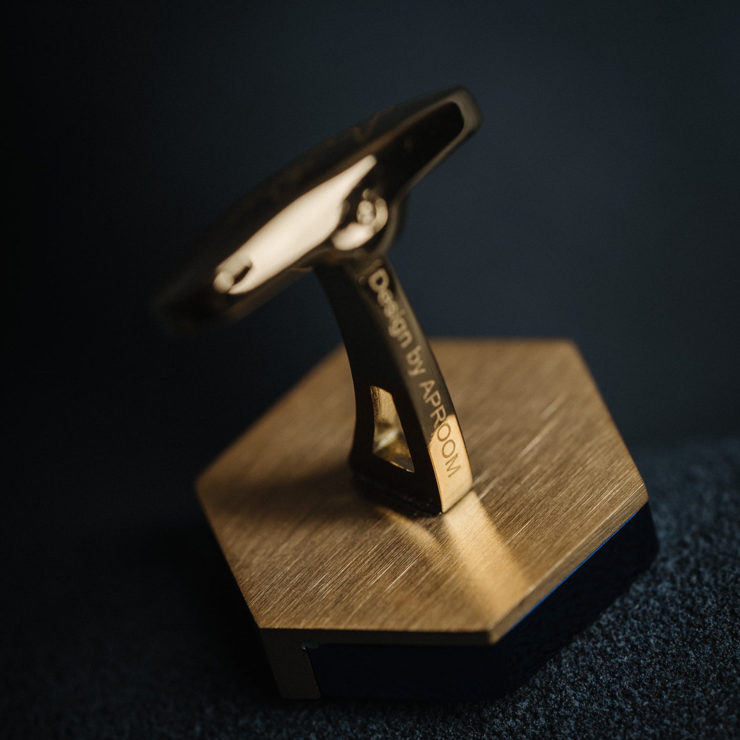 Close-Up of Blue Gold Cufflinks Featuring Polished Steel Construction