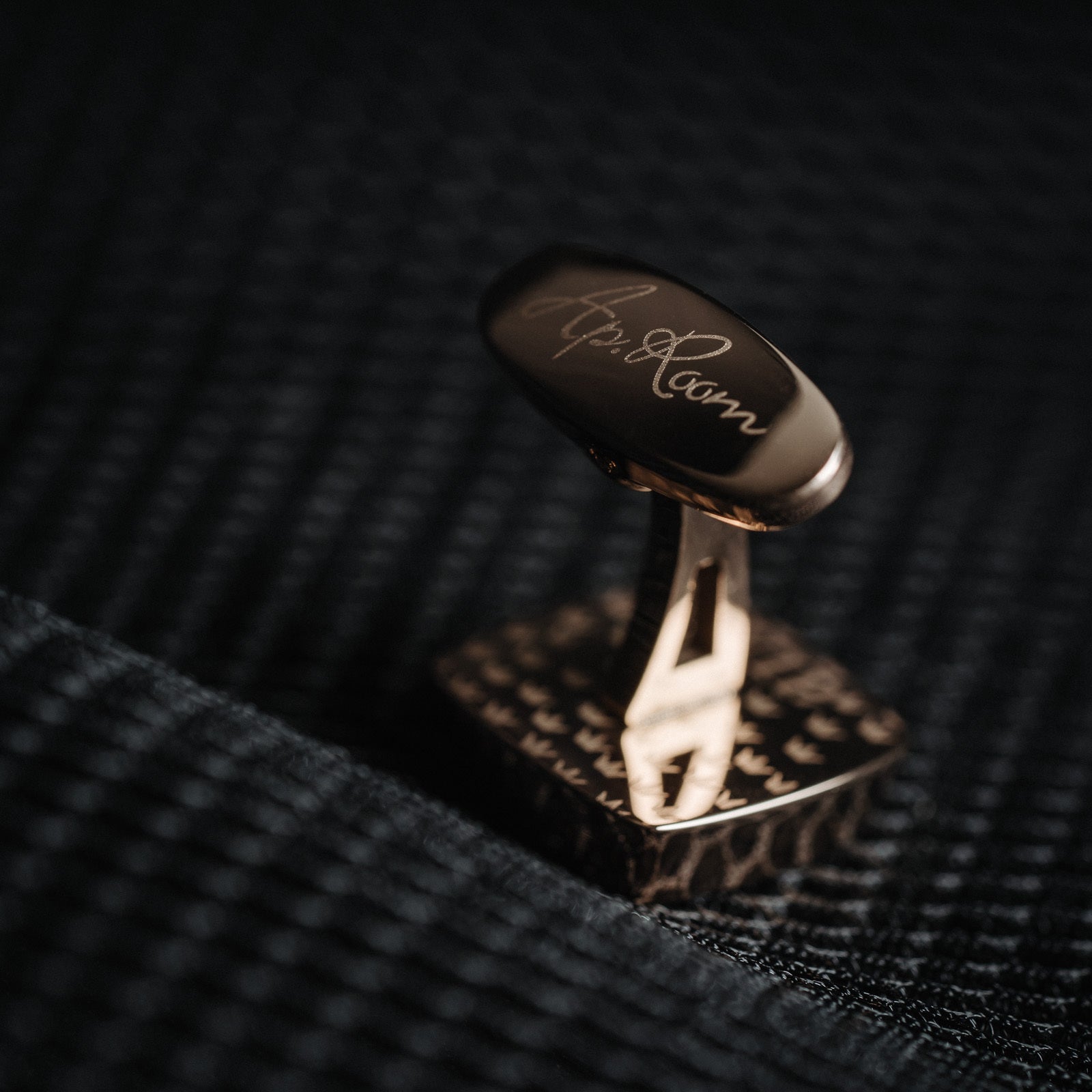 Close-Up of Rose Gold Cufflinks Highlighting the Polished Steel Finish