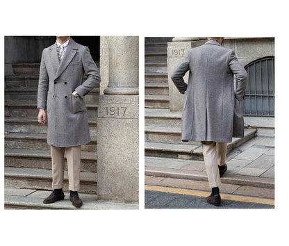 Grey wool coat with notched lapel and double-breasted buttons, a timeless addition to any wardrobe.