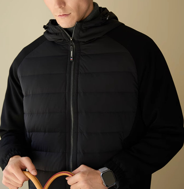 Side profile of the thin men’s down jacket with contrasting stitching and attached hood