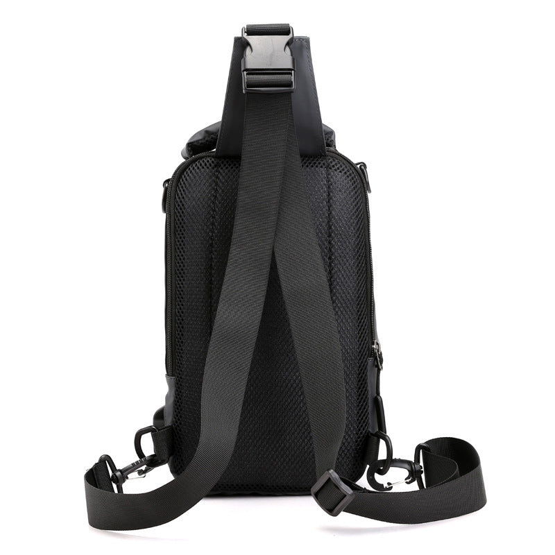 Close-up of built-in USB port on high-capacity men's backpack