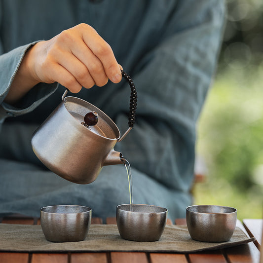 Complete Wild Wind Titanium Tea Set with teapot and five teacups.