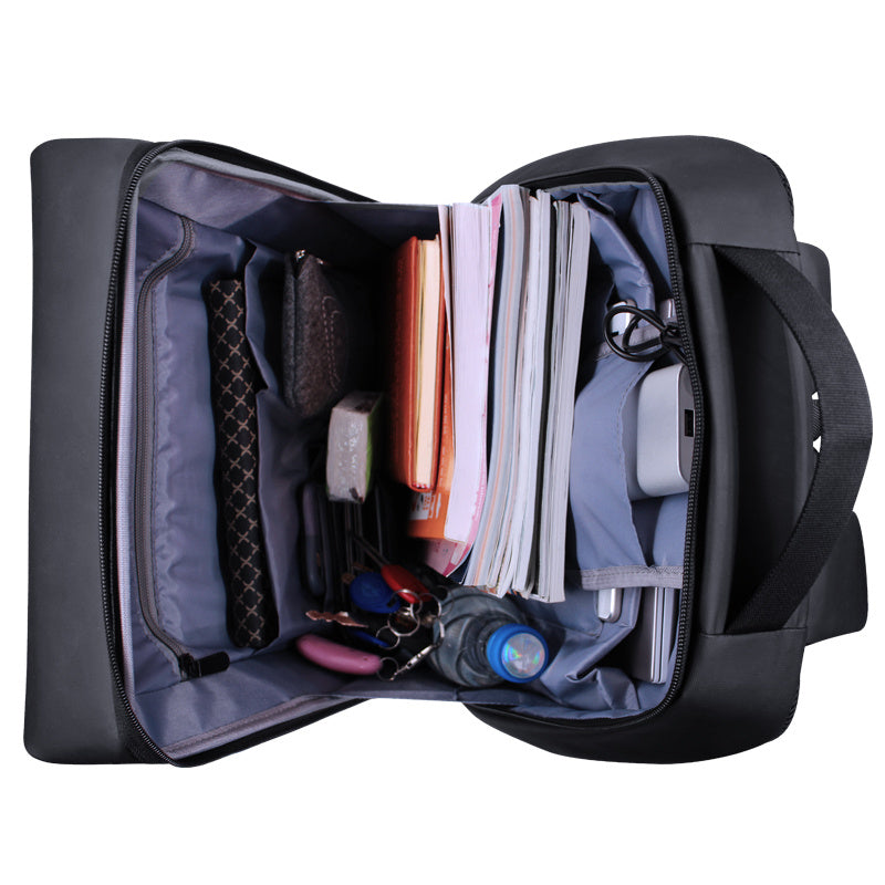 Black backpack with the top open, showcasing an organized interior with documents and compartments.