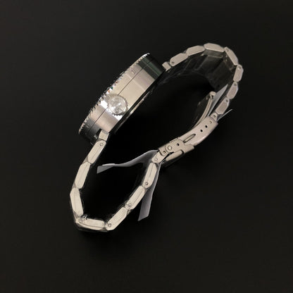 Right side view of the mechanical diving watch, highlighting its robust 14mm case and textured stainless steel strap.