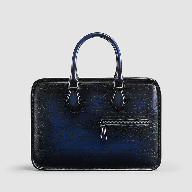 Hand-rubbed vintage leather business bag lettering in navy blue, ideal for modern professionals seeking style and functionality.