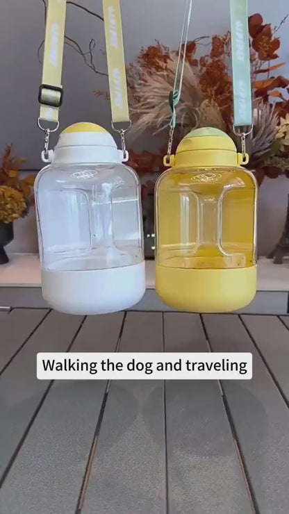  White dog water bottle with detachable food compartment and valve control.