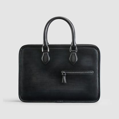 Hand-rubbed vintage leather business bag in smokey grey, combining sophistication with practicality.