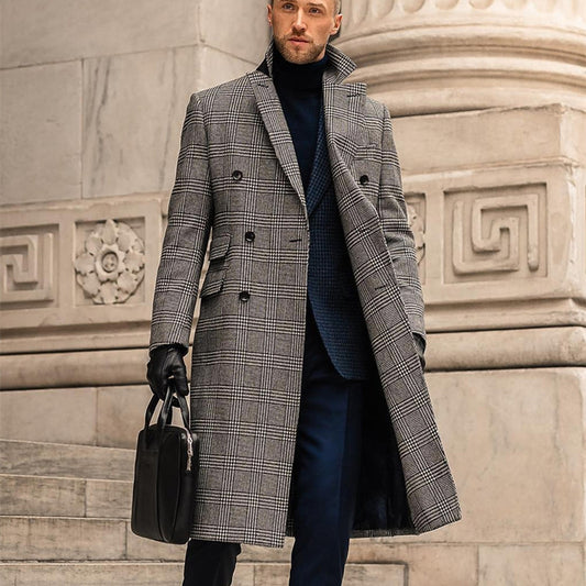 Modern man wearing a gray checkered overcoat and carrying a briefcase, standing near a Roman-style courthouse or government building.