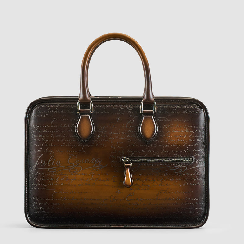 Hand-rubbed vintage leather business bag lettering in a warm tobacco color, perfect for professional and casual use.