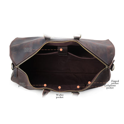 Top view of the vintage cowhide travel bag with its interior open and empty.